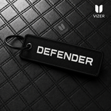 DEFENDER KEYCHAIN WITH METAL KEY RING