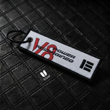 V8 BLACK/WHITE KEYCHAIN WITH METAL KEY RING