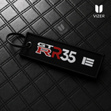 R35 BLACK KEYCHAIN WITH METAL KEY RING