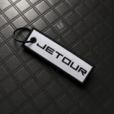 JETOUR WHITE KEYCHAIN WITH METAL KEY RING