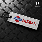 NISSAN WHITE KEYCHAIN WITH METAL KEY RING