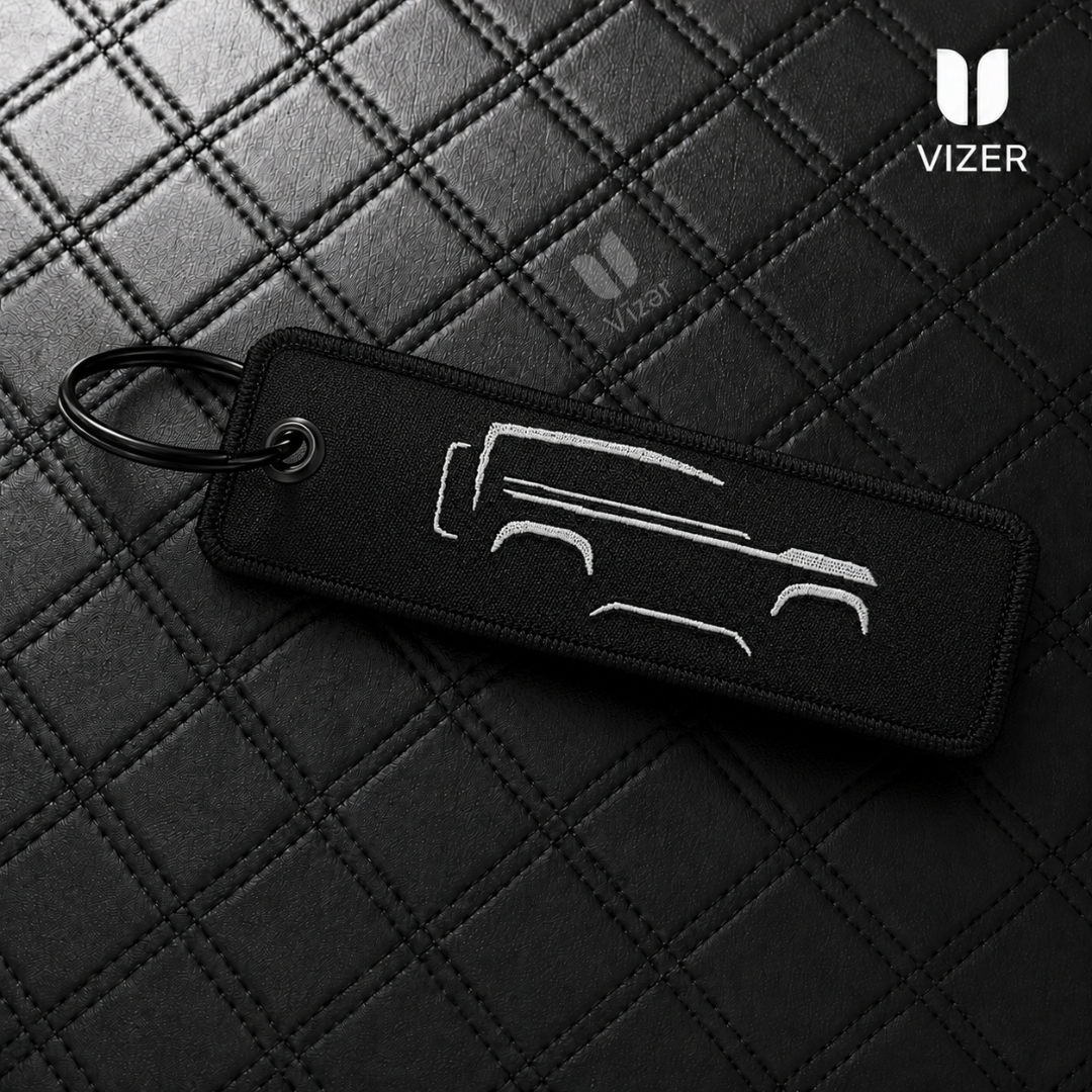 DEFENDER KEYCHAIN WITH METAL KEY RING